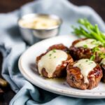 Sizzling garlic butter Steak Bites on a wooden board with parsley garnish
